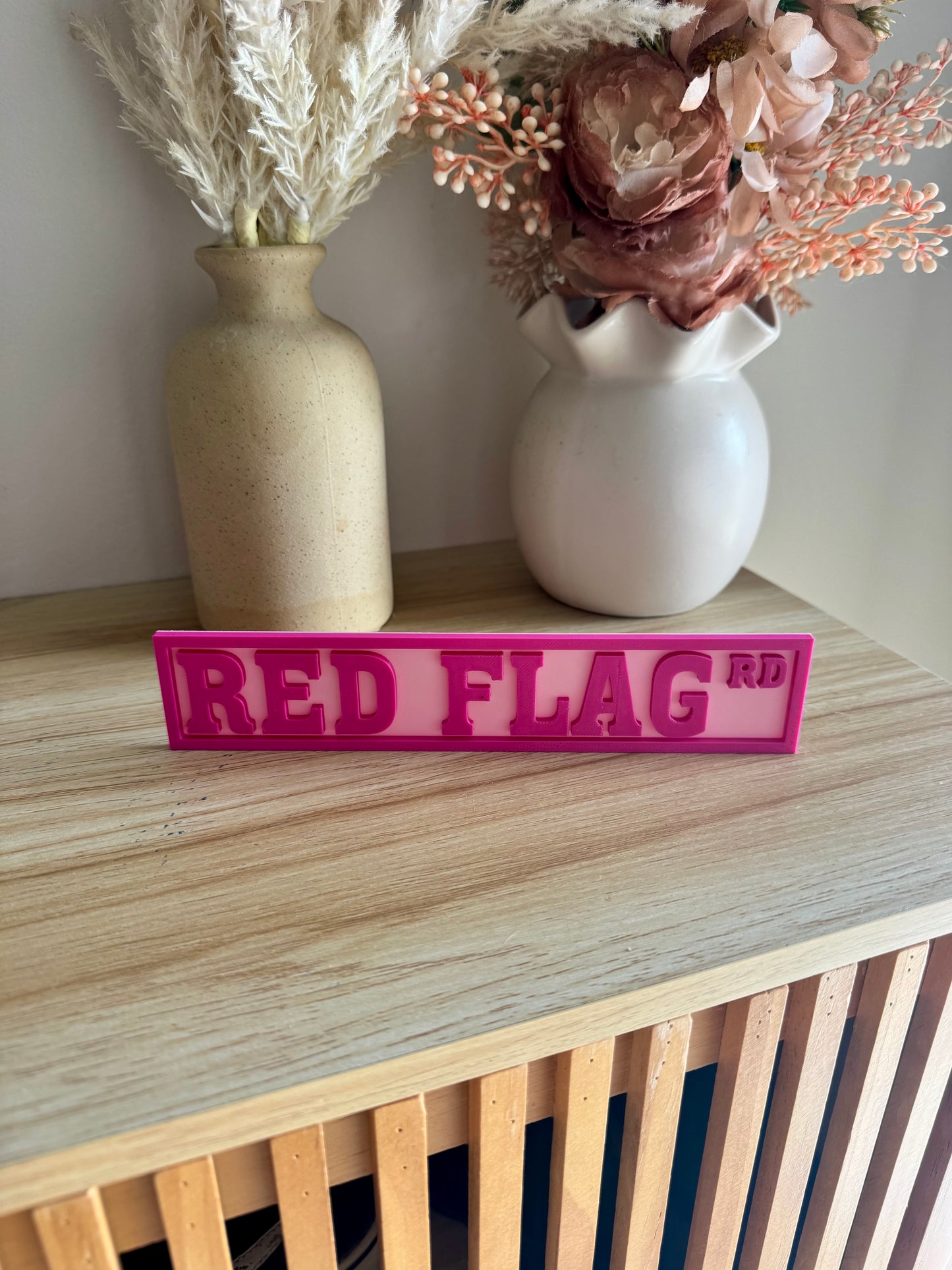 Red Flag Bookshelf Sign